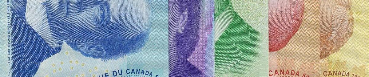 An image showing the corners of five different Canadian bank notes, lined up in order of value. The image shows the distinct colours for each denomination.